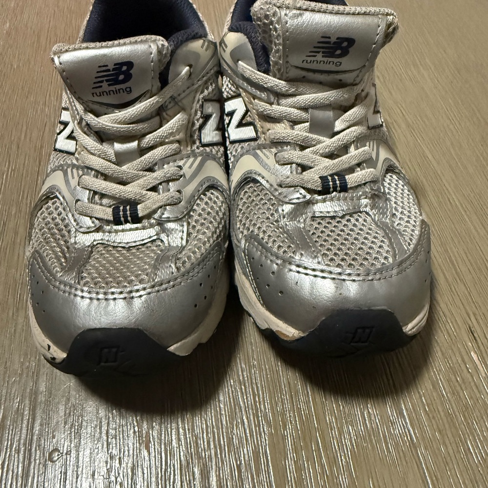 New Balance Metallic Silver Athletic Sneakers